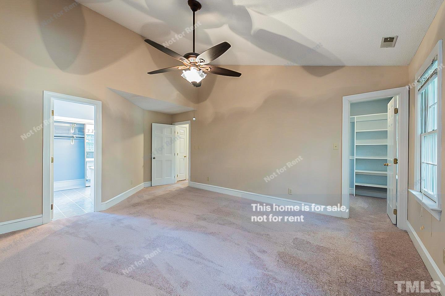 8335 Morgans Way Raleigh, NC 27613 - Photo 9 of 23 a view of an empty room with a window