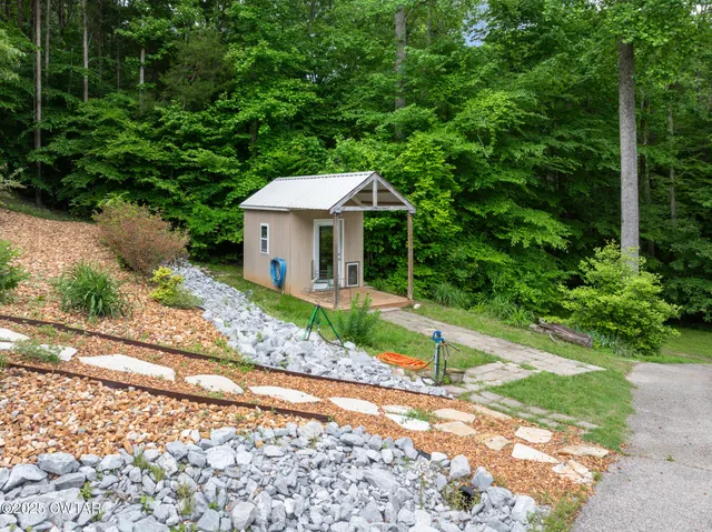 a view of a hallway with bathroom