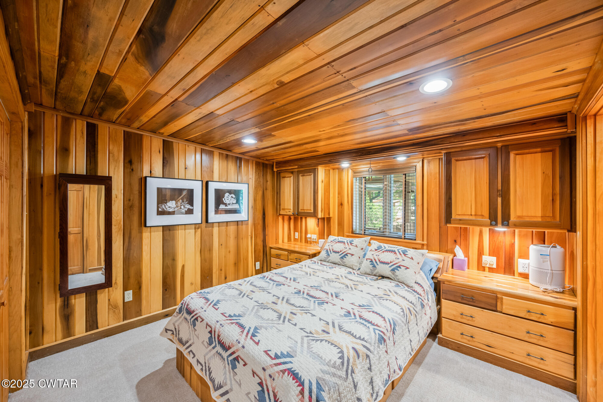 973 Old Lavinia Road Cedar Grove, TN 38321 - Photo 36 of 51 a bed sitting in a spacious bedroom next to a window