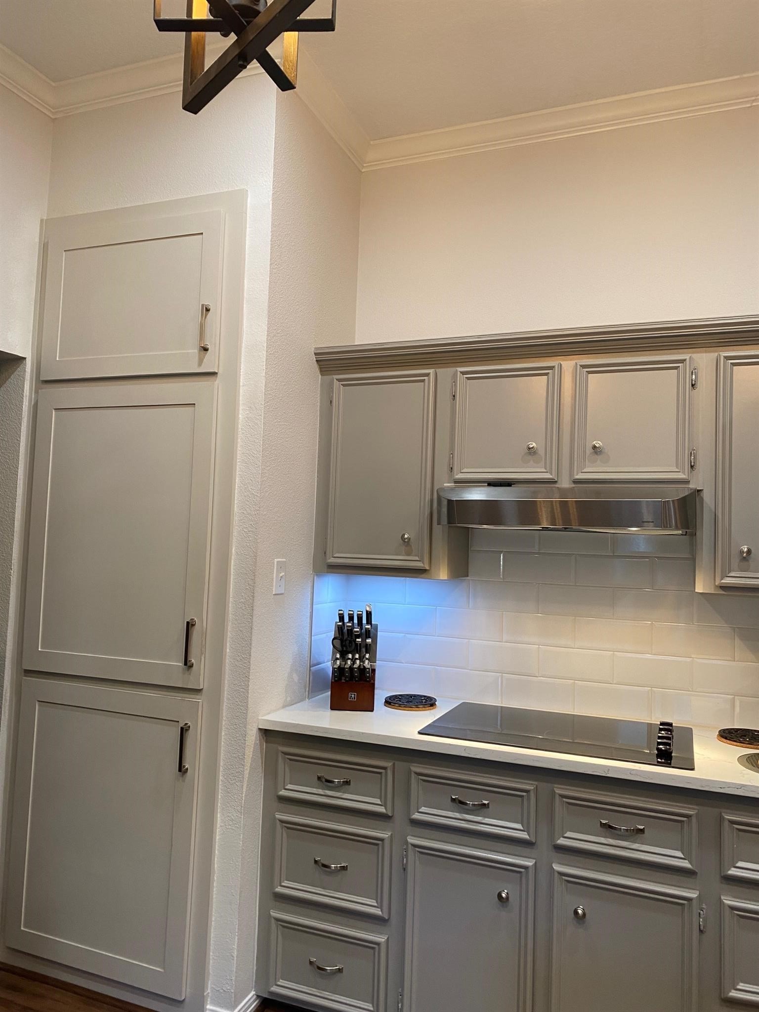 77 Panorama Drive Conroe, TX 77304 - Photo 21 of 49 a kitchen with stainless steel appliances a refrigerator and cabinets
