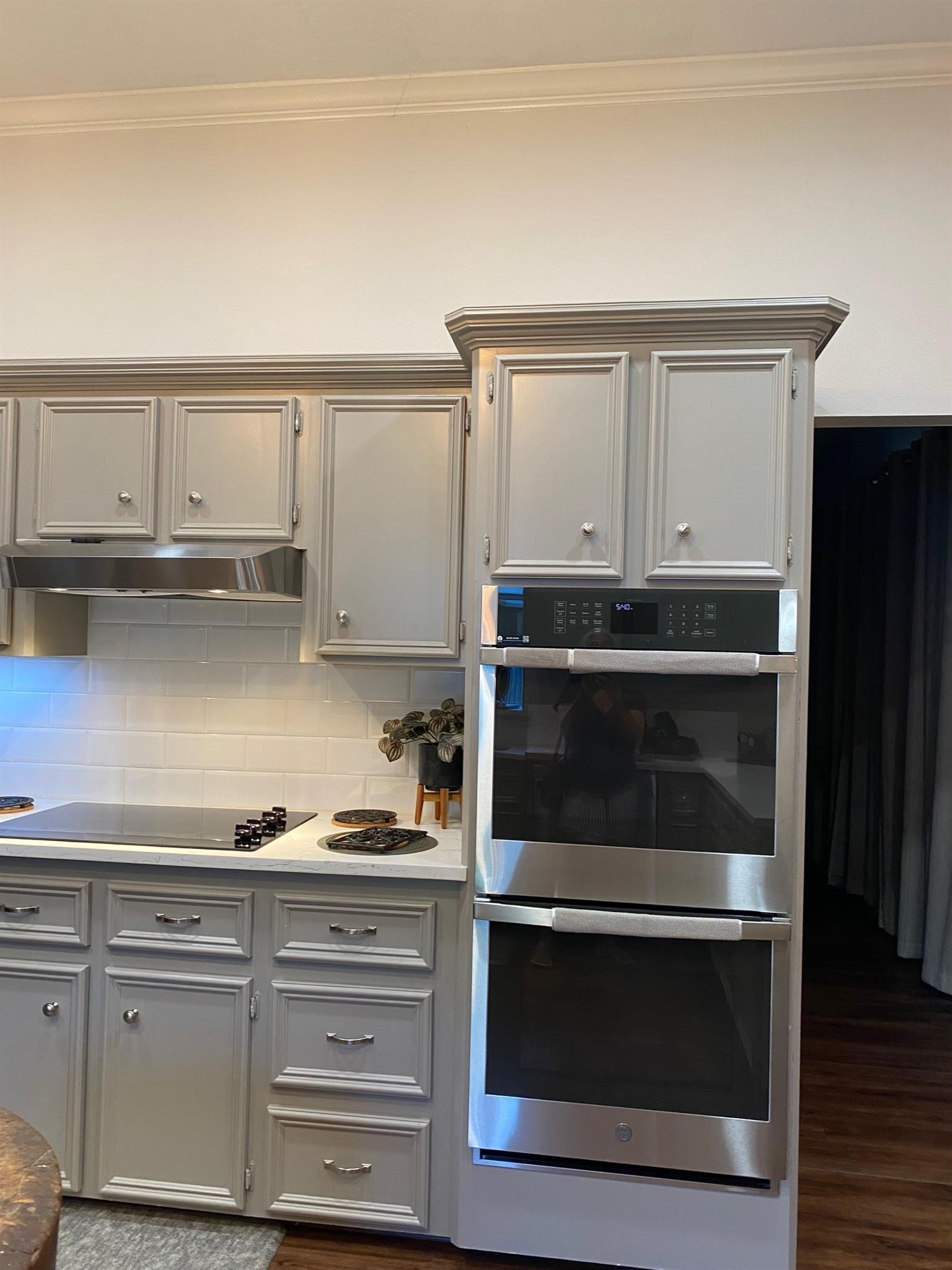 77 Panorama Drive Conroe, TX 77304 - Photo 22 of 49 a kitchen with granite countertop white cabinets and stainless steel appliances