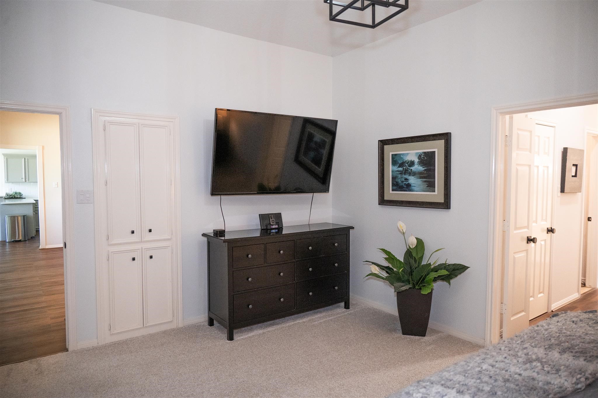 77 Panorama Drive Conroe, TX 77304 - Photo 28 of 49 a living room with furniture and a flat screen tv