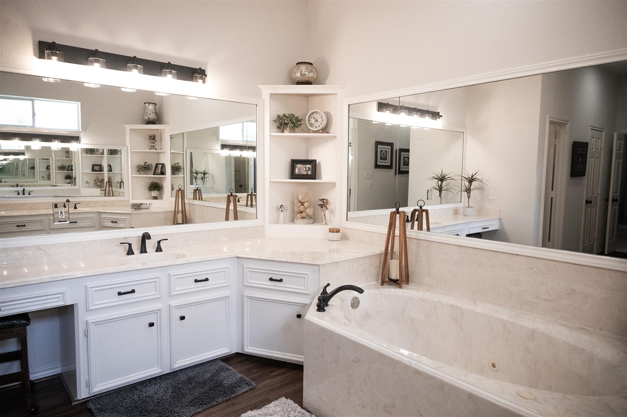 77 Panorama Drive Conroe, TX 77304 - Photo 29 of 49 a bathroom with a double vanity sink mirror and bathtub
