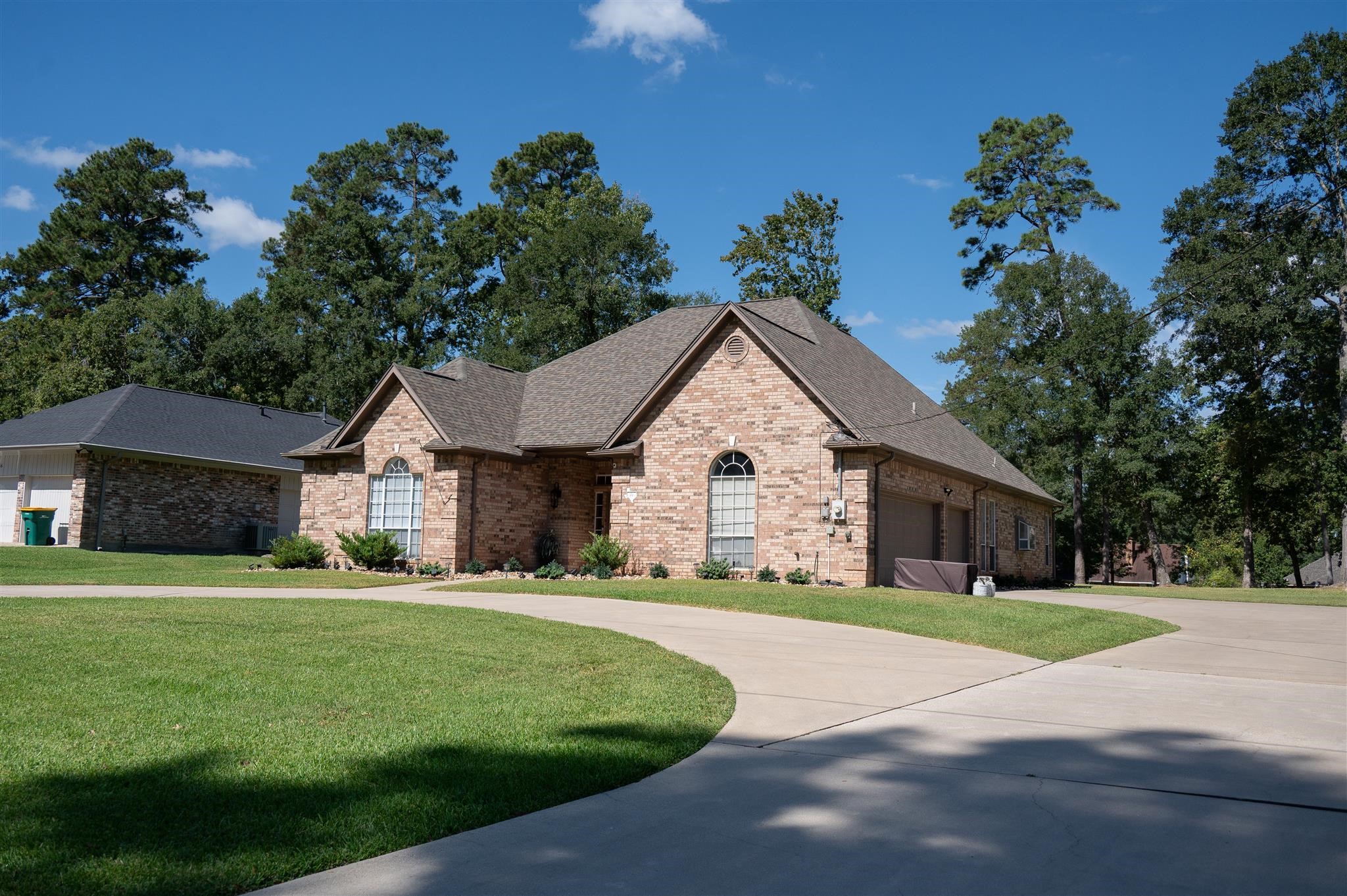 77 Panorama Drive Conroe, TX 77304 - Photo 3 of 49 a front view of house with yard and green space