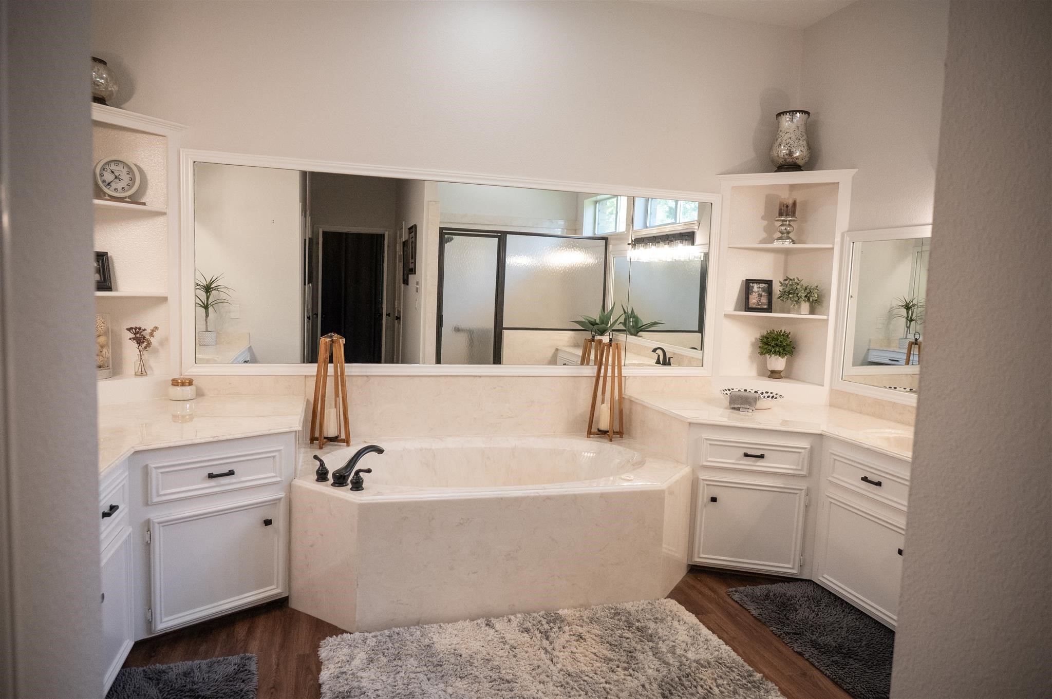 77 Panorama Drive Conroe, TX 77304 - Photo 31 of 49 a bathroom with a double vanity sink mirror and bathtub