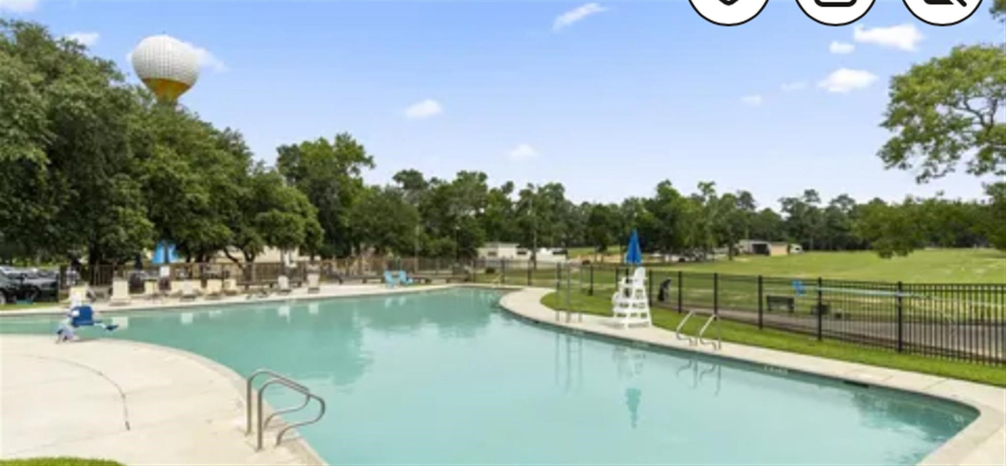 77 Panorama Drive Conroe, TX 77304 - Photo 46 of 49 a view of a swimming pool with a lake view