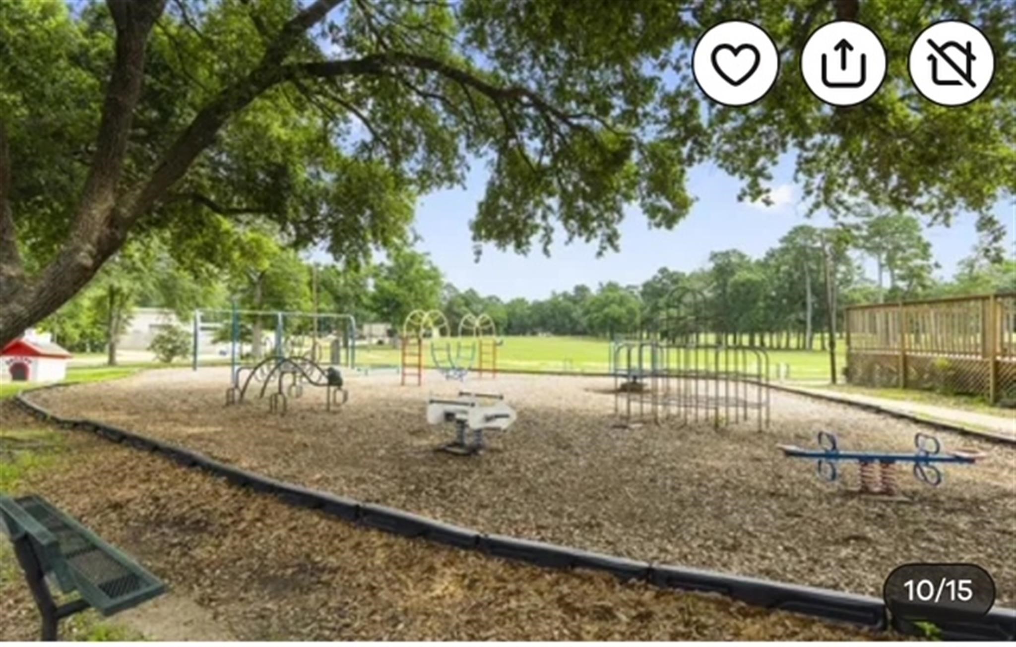 77 Panorama Drive Conroe, TX 77304 - Photo 47 of 49 a view of a park with iron fence