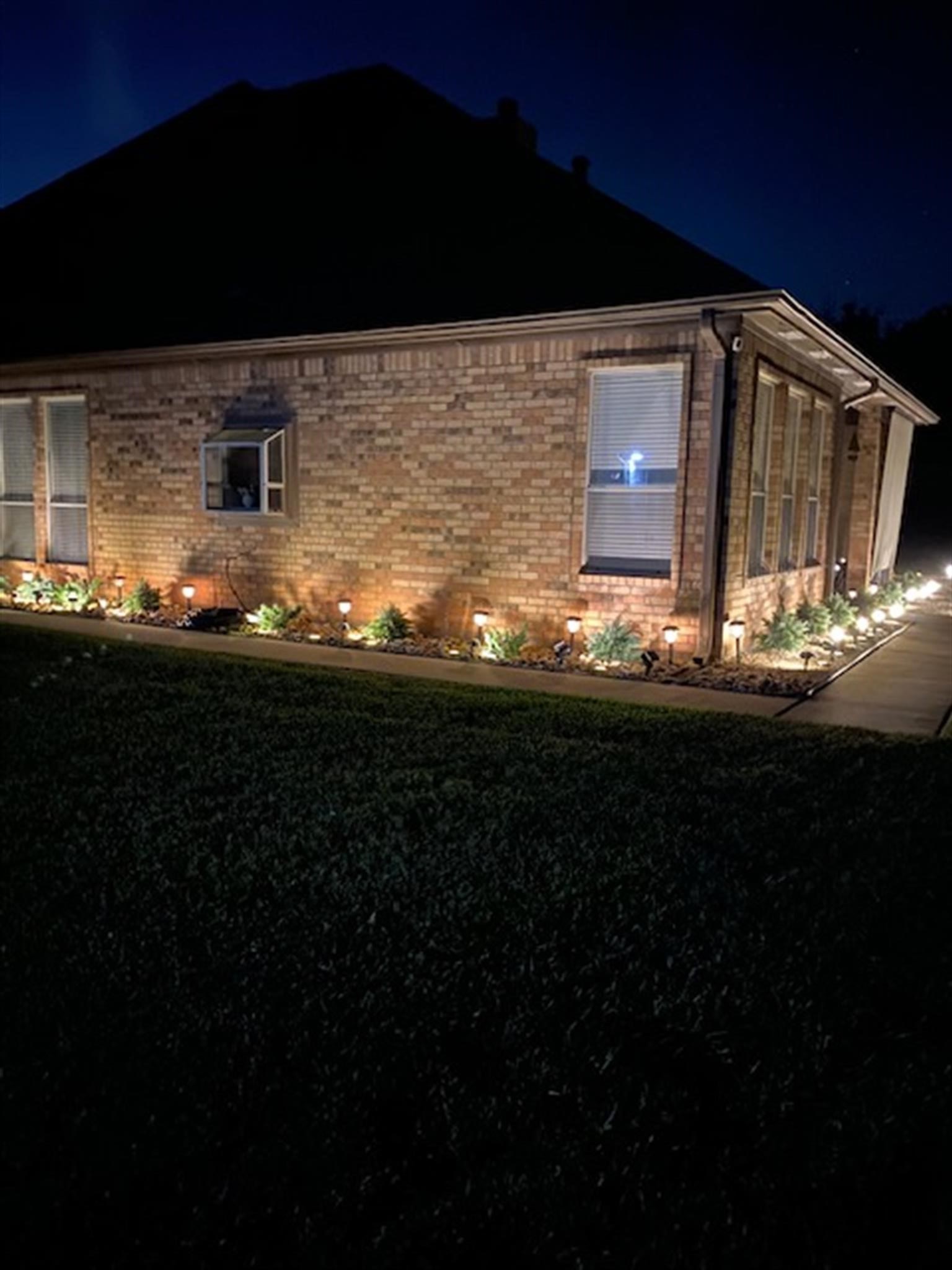 77 Panorama Drive Conroe, TX 77304 - Photo 6 of 49 a kitchen with table and chairs