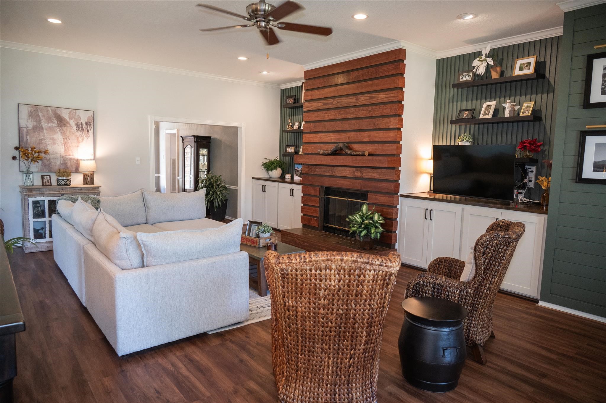 77 Panorama Drive Conroe, TX 77304 - Photo 10 of 49 a living room with furniture a flat screen tv and a fireplace