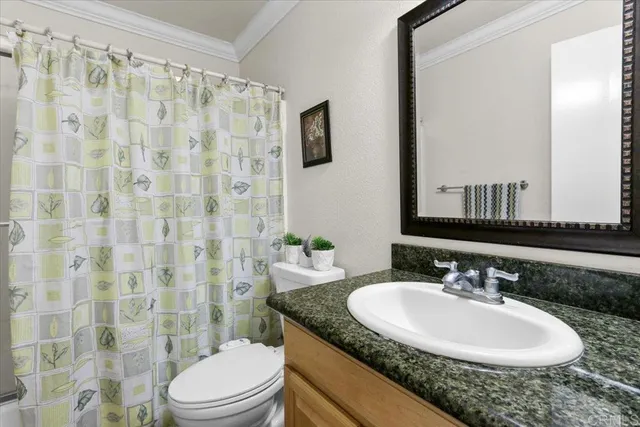 an empty room with mirror in it