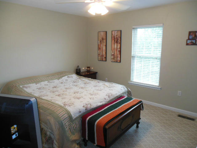 4751 West Westvale Road Northeast Roanoke, VA 24019 - Photo 11 of 25 a bedroom with a bed and a window