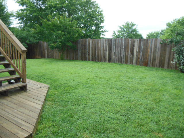 4751 West Westvale Road Northeast Roanoke, VA 24019 - Photo 21 of 25 a view of a backyard with wooden fence