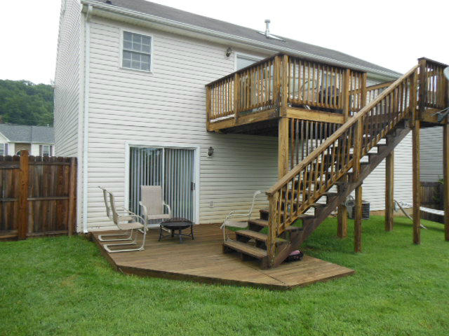 4751 West Westvale Road Northeast Roanoke, VA 24019 - Photo 22 of 25 a view of a house with backyard and wooden stairs