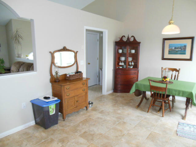 4751 West Westvale Road Northeast Roanoke, VA 24019 - Photo 4 of 25 a room with furniture a piano and wooden floor