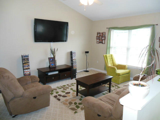 4751 West Westvale Road Northeast Roanoke, VA 24019 - Photo 6 of 25 a living room with furniture and a flat screen tv