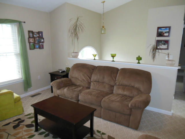 4751 West Westvale Road Northeast Roanoke, VA 24019 - Photo 7 of 25 a living room with furniture and a window