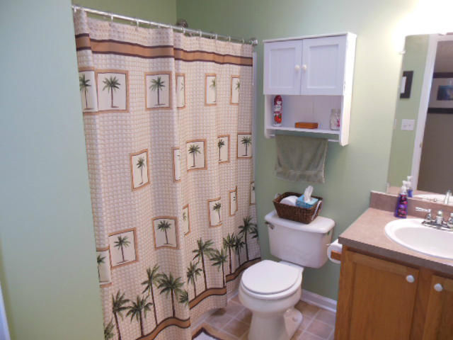 4751 West Westvale Road Northeast Roanoke, VA 24019 - Photo 8 of 25 a bathroom with a sink toilet and shower