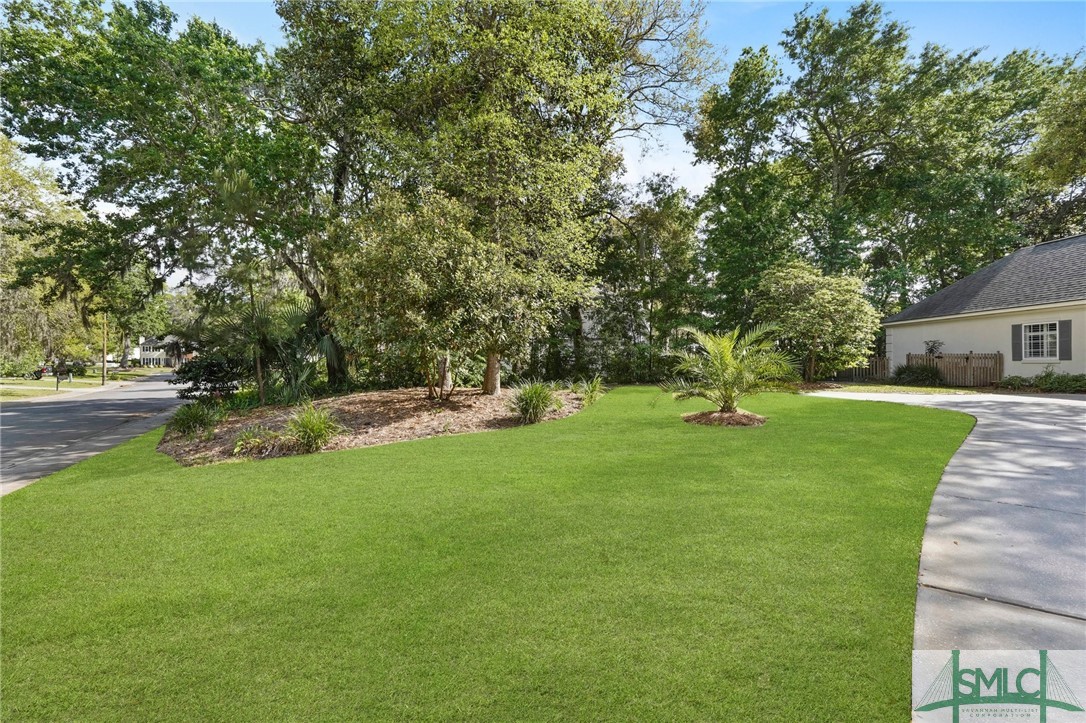 114 Farringdon Circle Savannah, GA 31410 - Photo 39 of 45 Lot extends past trees to the left