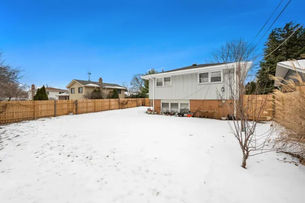 a view of a road with a building in the background