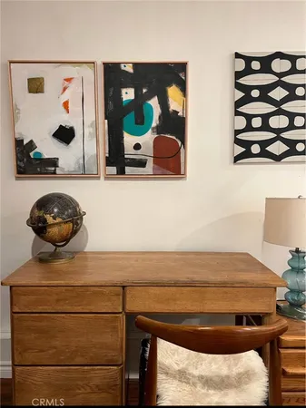 a bathroom with a double vanity sink mirror and toilet