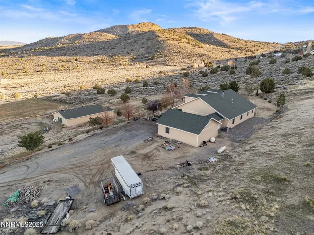 a view of an ocean beach and mountain