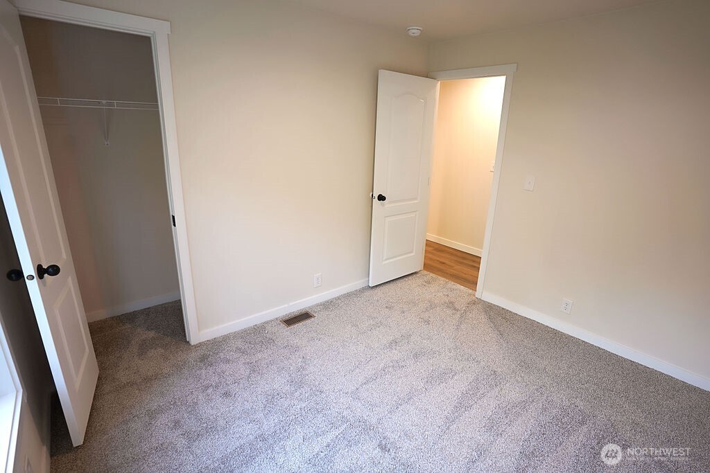 50 East Lookout Court Grapeview, WA 98546 - Photo 20 of 34 an empty room with closet