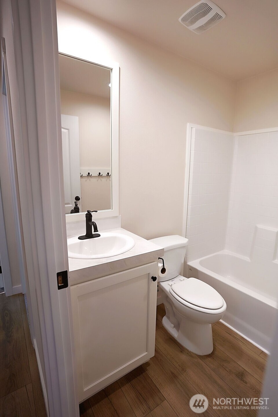 50 East Lookout Court Grapeview, WA 98546 - Photo 22 of 34 a bathroom with a sink toilet and shower