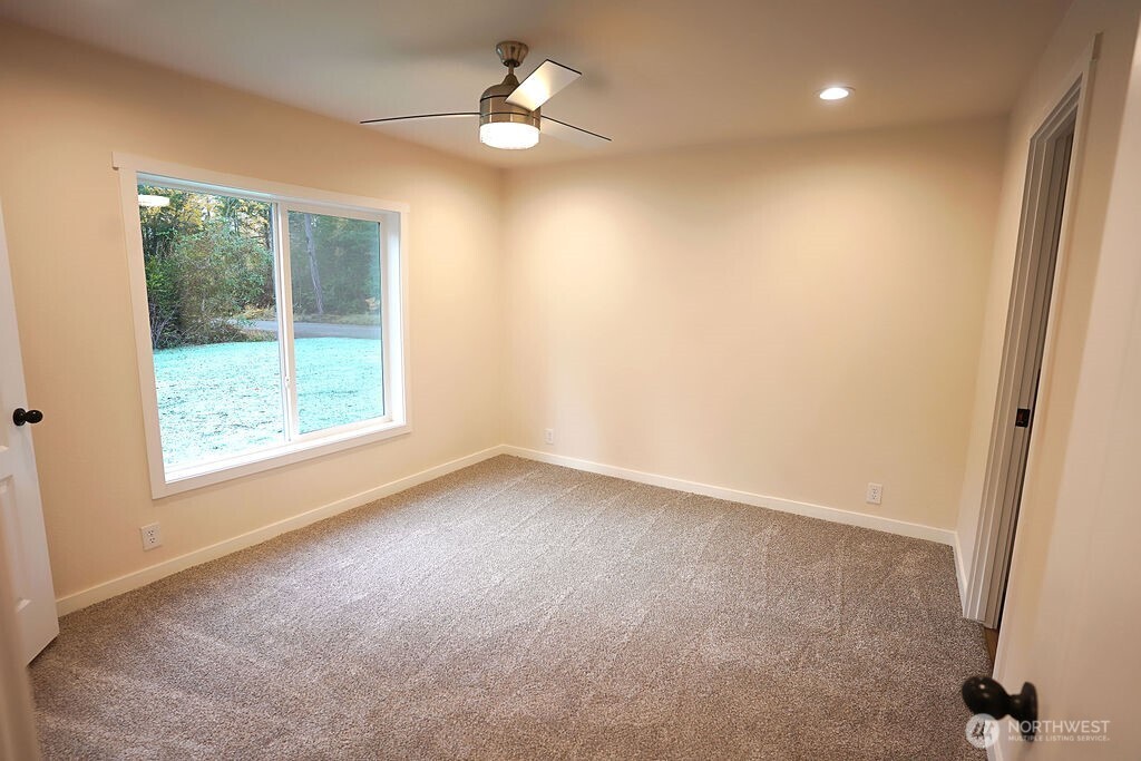 50 East Lookout Court Grapeview, WA 98546 - Photo 24 of 34 an empty room with a window