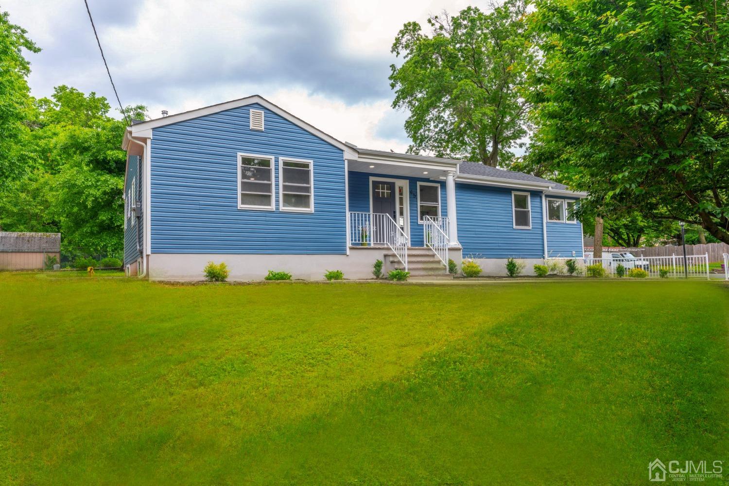 45 East Cliff Road Colonia, NJ 07067 - Photo 1 of 31 a front view of house with yard and green space