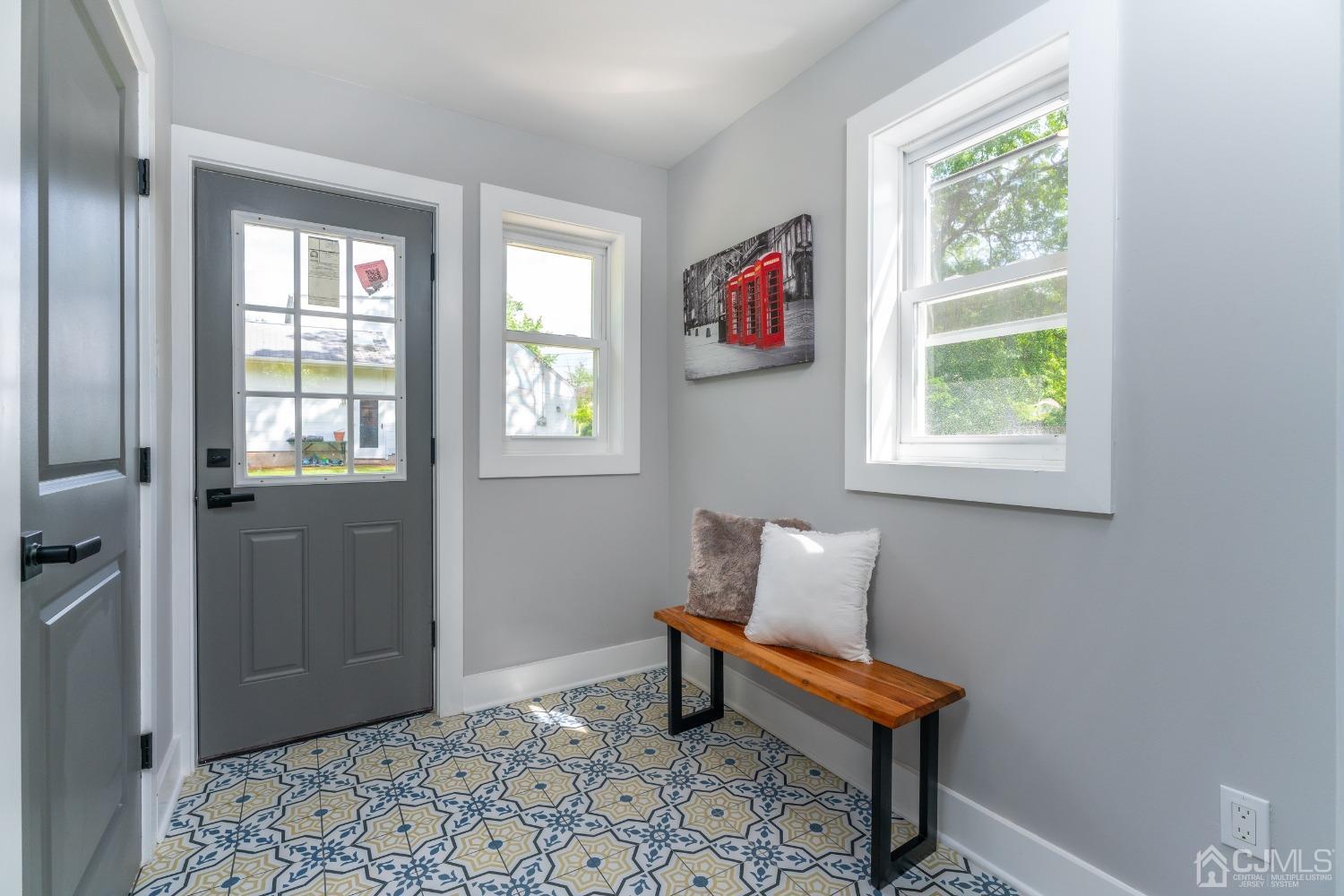 45 East Cliff Road Colonia, NJ 07067 - Photo 11 of 31 a bench sitting in a bedroom next to a window