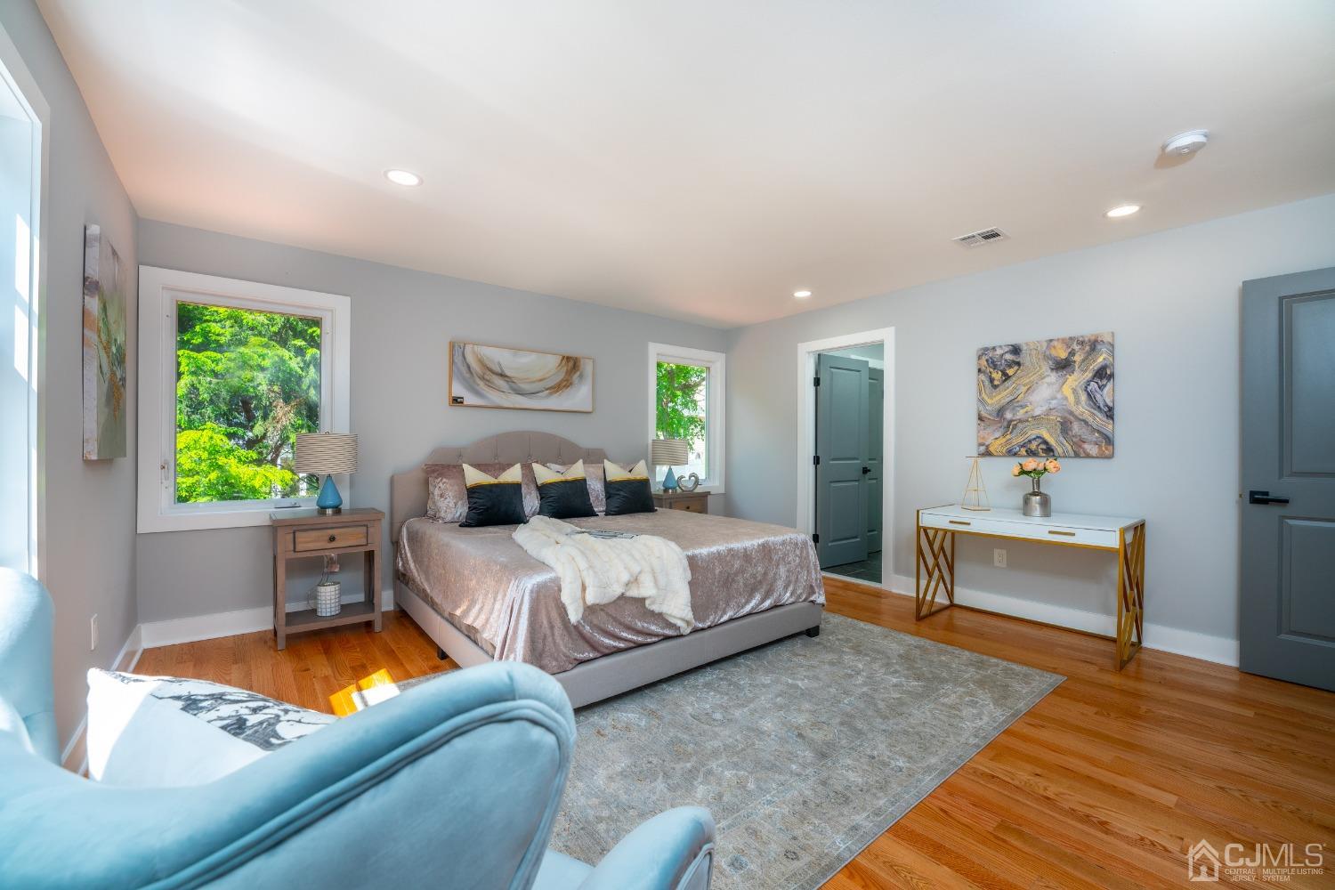 45 East Cliff Road Colonia, NJ 07067 - Photo 16 of 31 a bed room with a bed and a couch