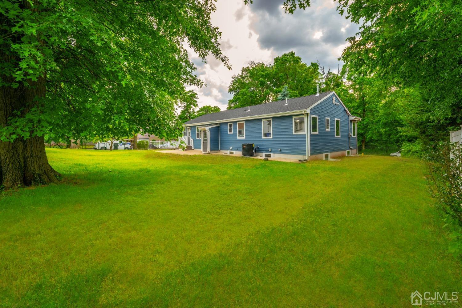 45 East Cliff Road Colonia, NJ 07067 - Photo 29 of 31 a view of a house with a big yard