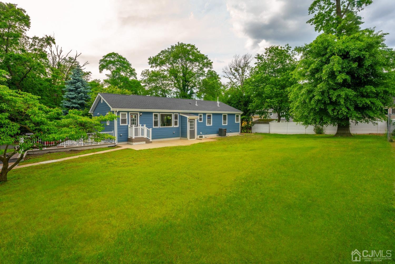 45 East Cliff Road Colonia, NJ 07067 - Photo 30 of 31 a view of a house with a big yard
