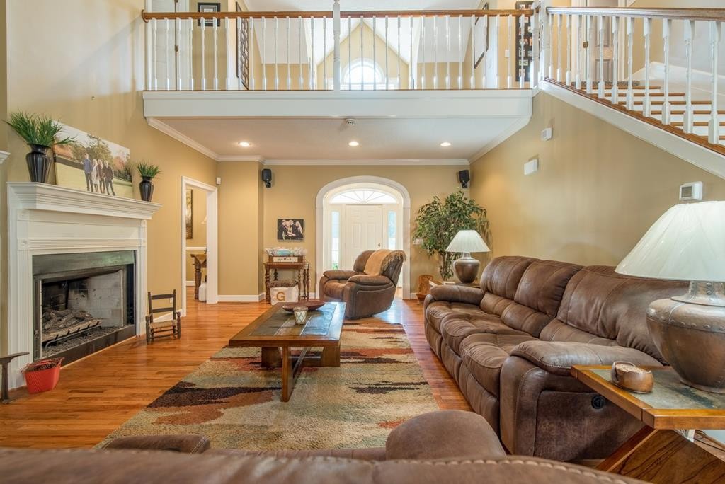 1408 Beaverdale Road Dalton, GA 30721 - Photo 12 of 51 a living room with furniture and a fireplace