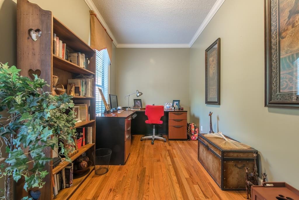 1408 Beaverdale Road Dalton, GA 30721 - Photo 16 of 51 a living room with furniture and a wooden floor