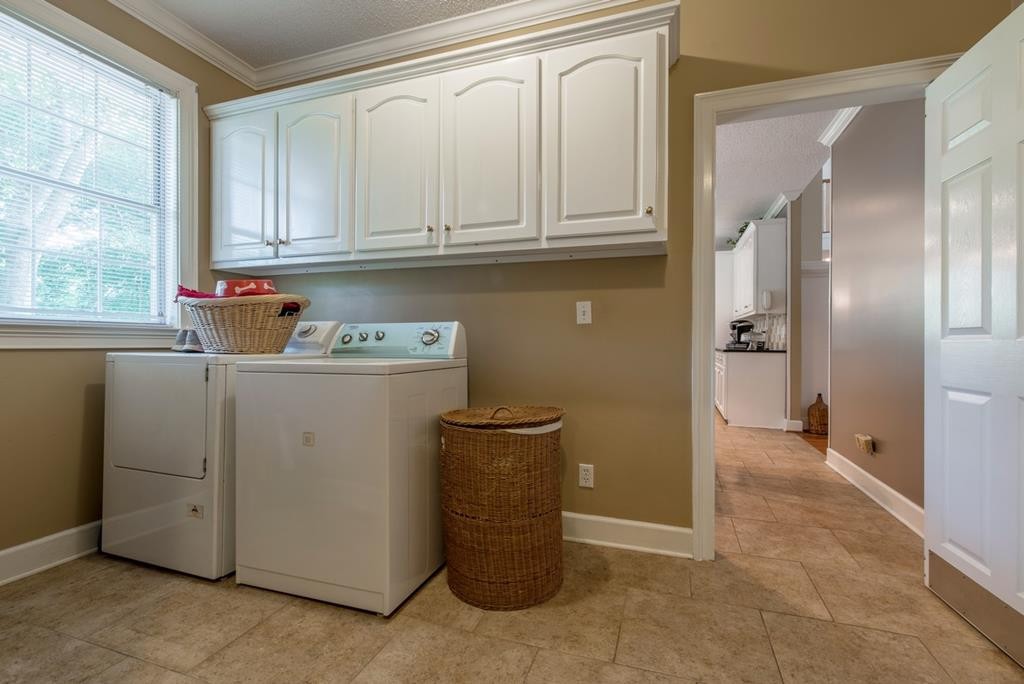 1408 Beaverdale Road Dalton, GA 30721 - Photo 29 of 51 a room with a washer and dryer