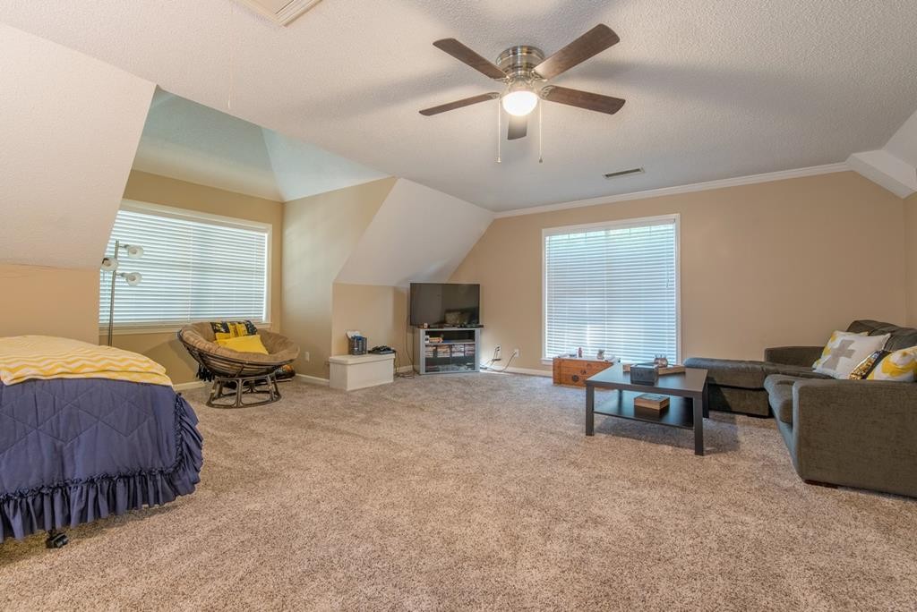 1408 Beaverdale Road Dalton, GA 30721 - Photo 35 of 51 a living room with furniture and a large window