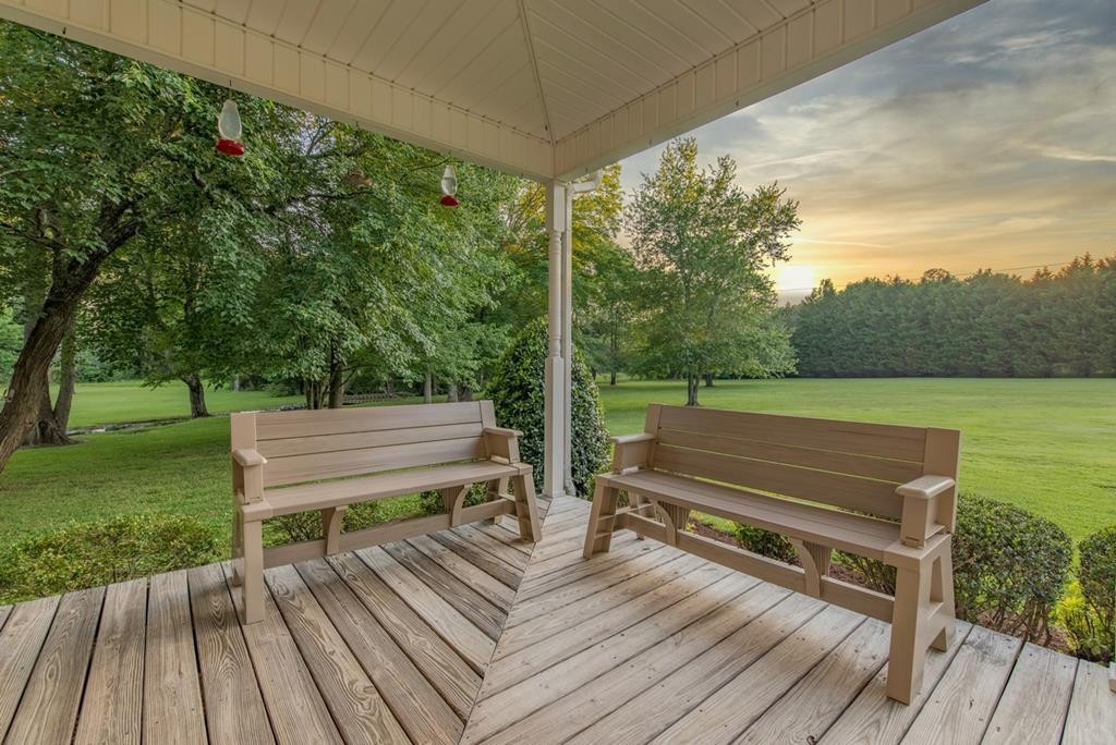 1408 Beaverdale Road Dalton, GA 30721 - Photo 51 of 51 a view of a wooden deck with a bench