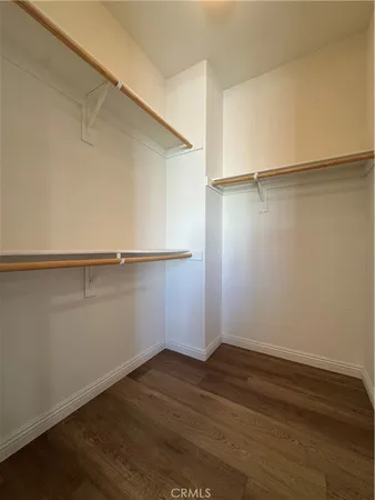 a view of an empty walk in closet
