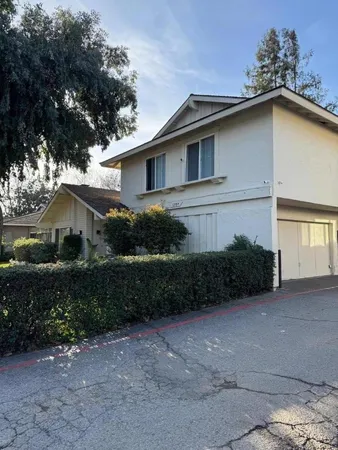 a house that has a lot of plants in it