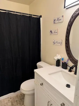 a bathroom with a sink and a toilet