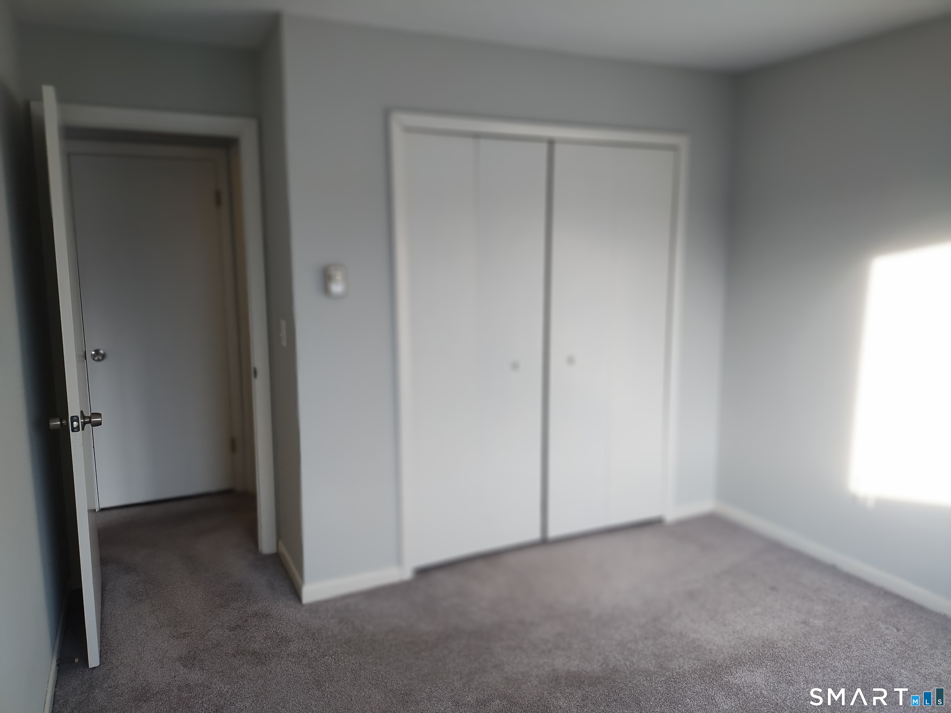 115 Short Beach Road, Unit 307 Stratford, CT 06615 - Photo 12 of 32 a view of an empty room