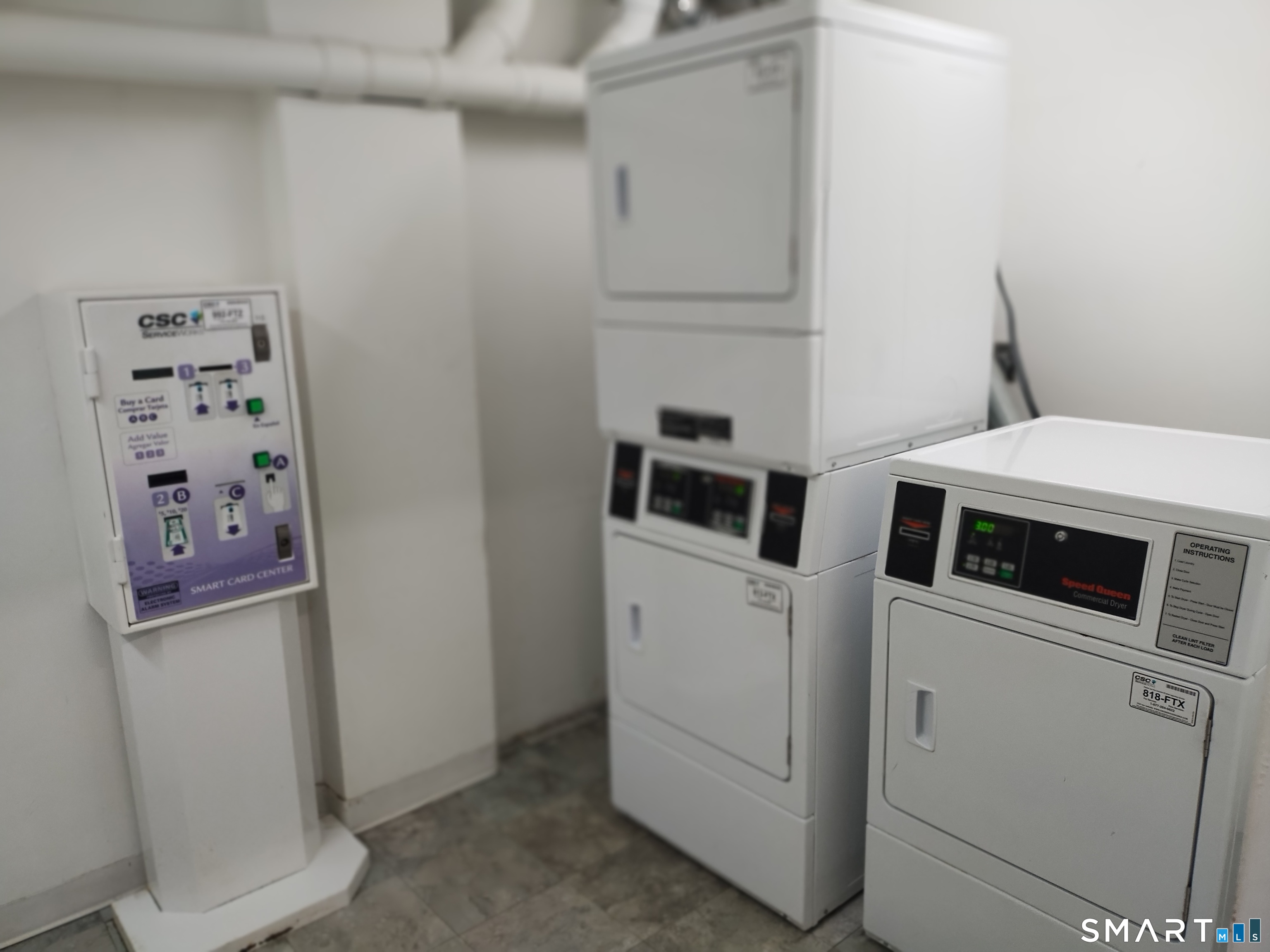 115 Short Beach Road, Unit 307 Stratford, CT 06615 - Photo 26 of 32 a utility room with dryer and washer