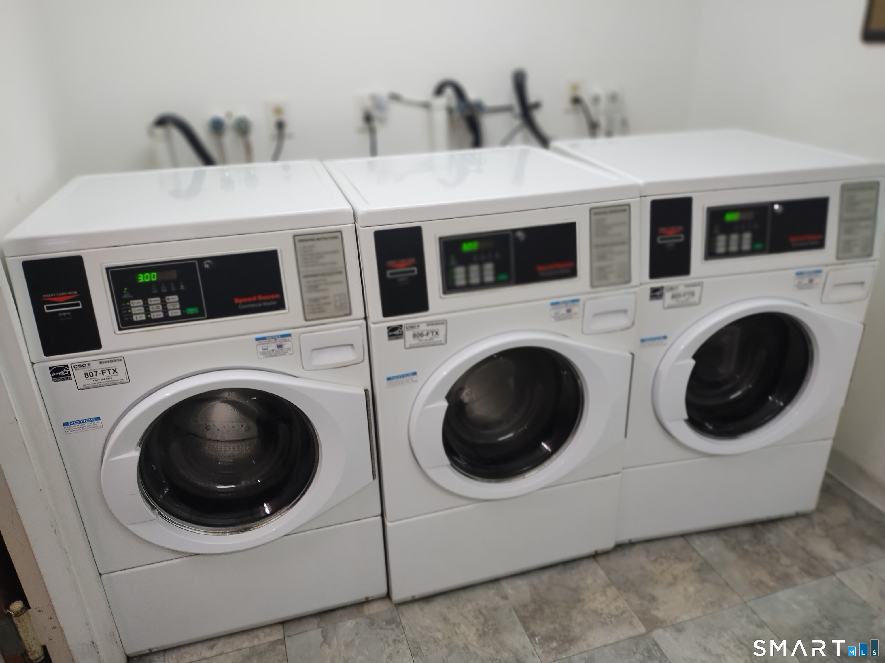 115 Short Beach Road, Unit 307 Stratford, CT 06615 - Photo 27 of 32 a utility room with dryer and washer