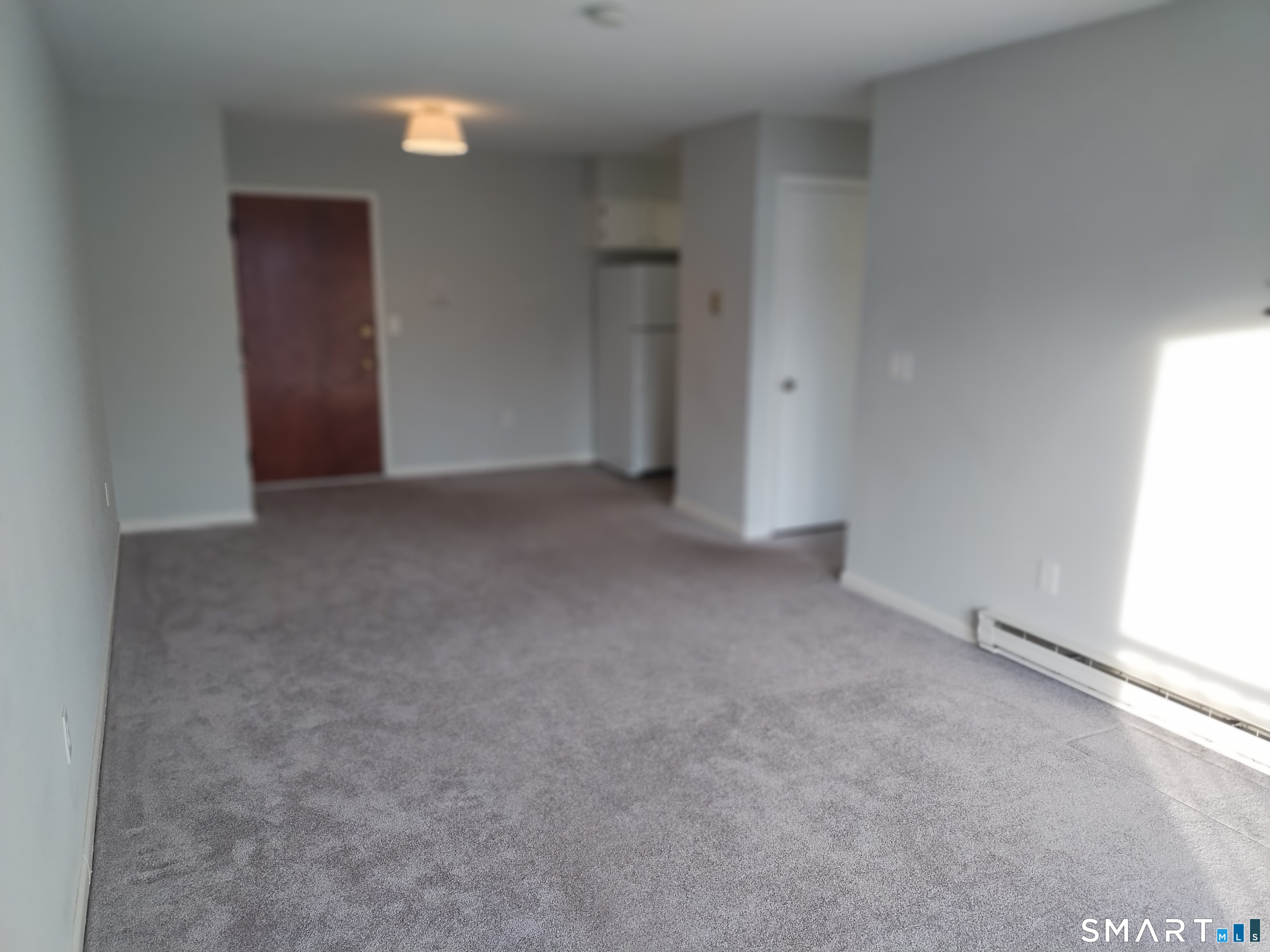 115 Short Beach Road, Unit 307 Stratford, CT 06615 - Photo 9 of 32 a view of empty room