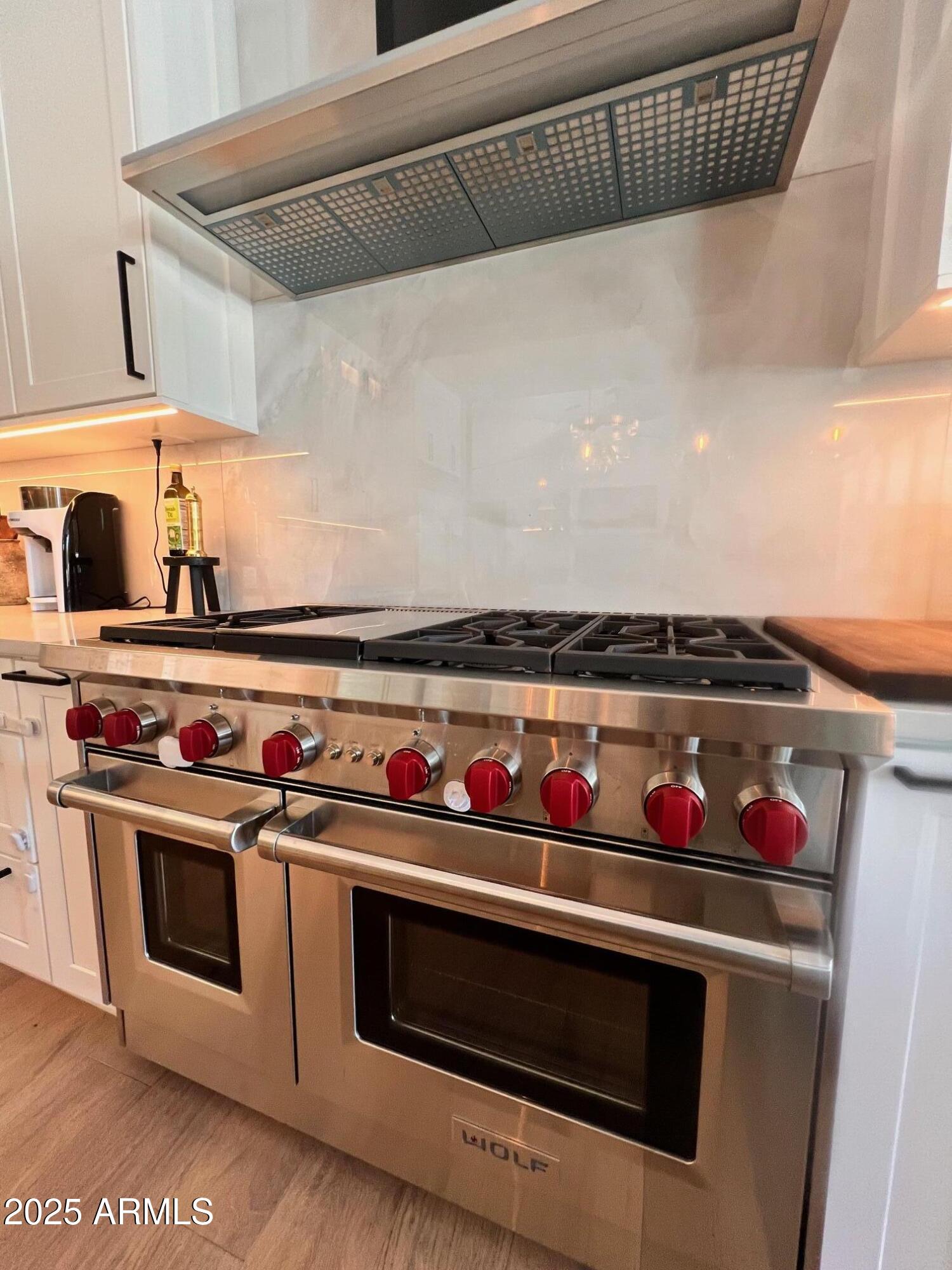 2912 East Pierson Street Phoenix, AZ 85016 - Photo 10 of 39 a white stove top oven sitting inside of a kitchen