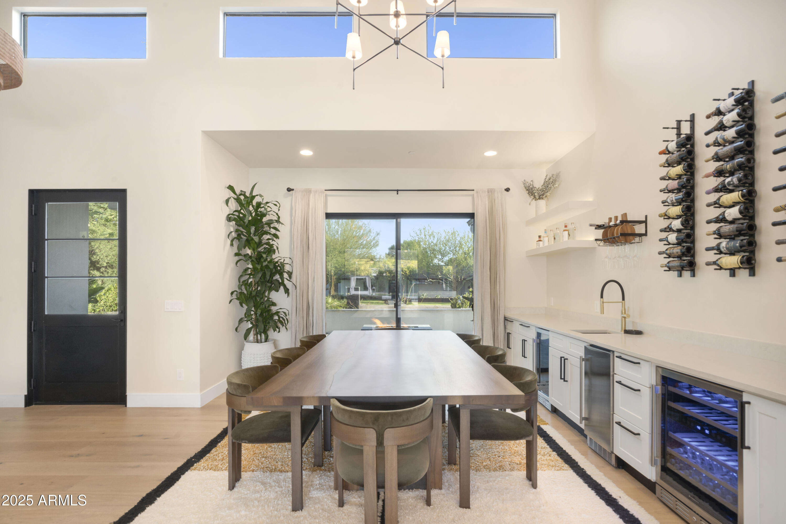 2912 East Pierson Street Phoenix, AZ 85016 - Photo 12 of 39 a view of a dining room with furniture window and wooden floor