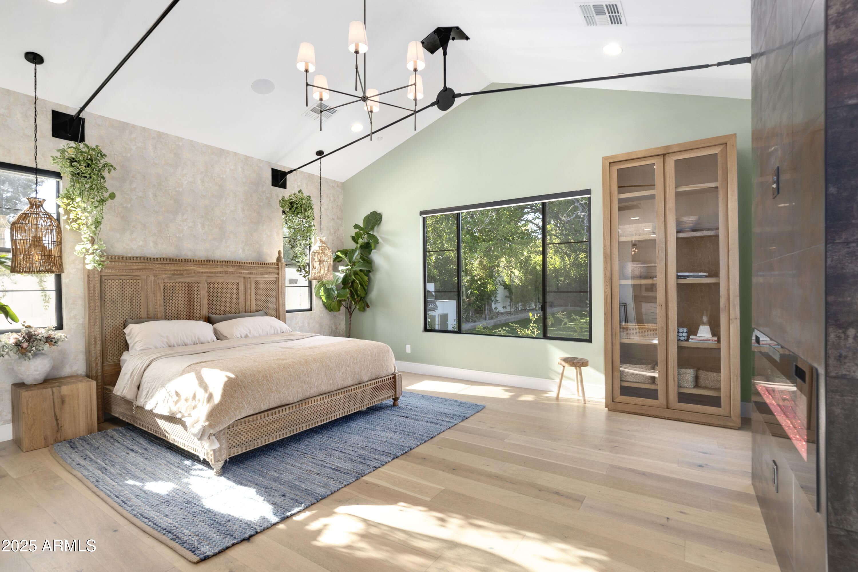 2912 East Pierson Street Phoenix, AZ 85016 - Photo 14 of 39 a bedroom with a bed lamp closet and large window