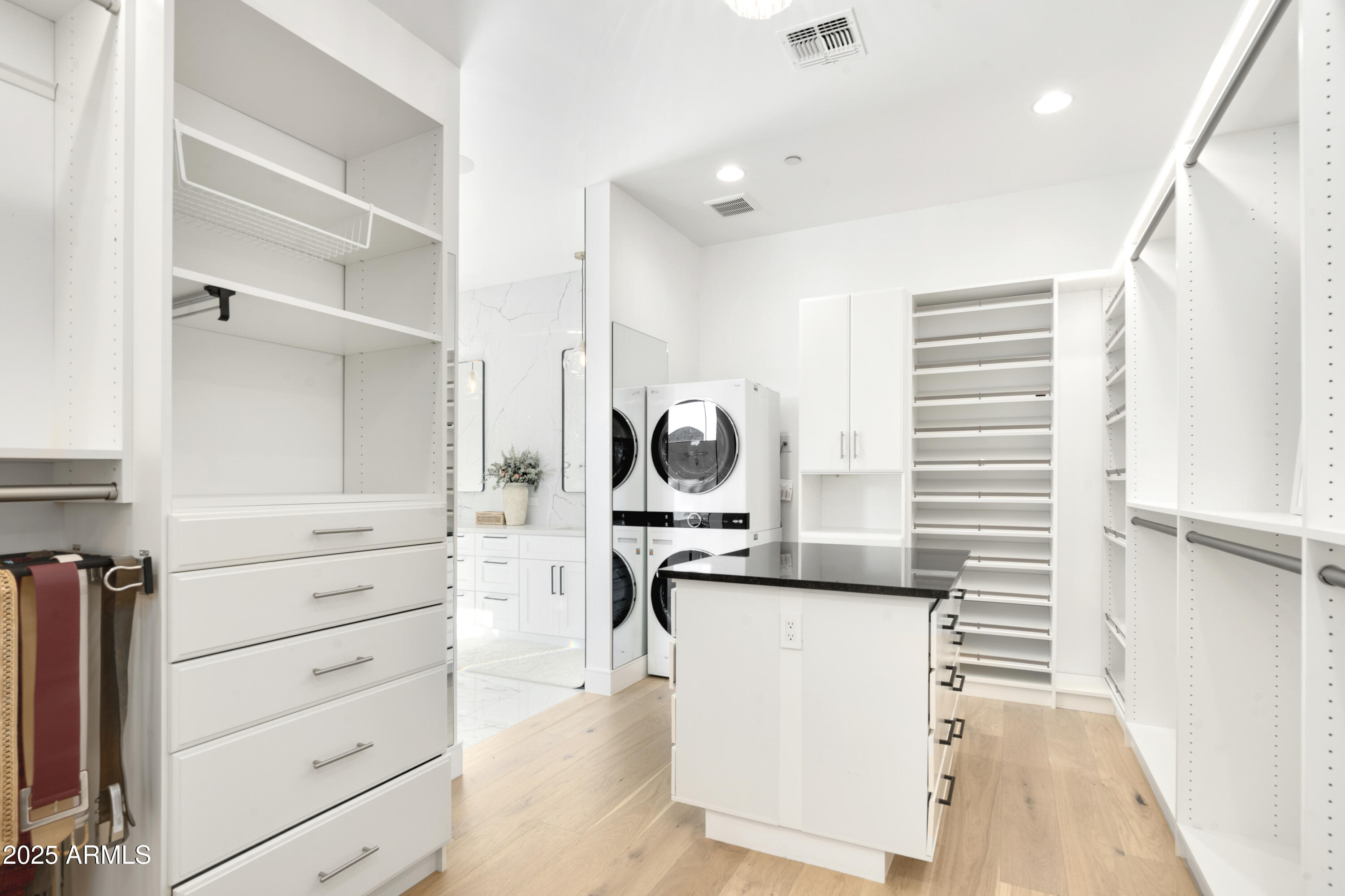 2912 East Pierson Street Phoenix, AZ 85016 - Photo 22 of 39 a kitchen with a refrigerator and white cabinets