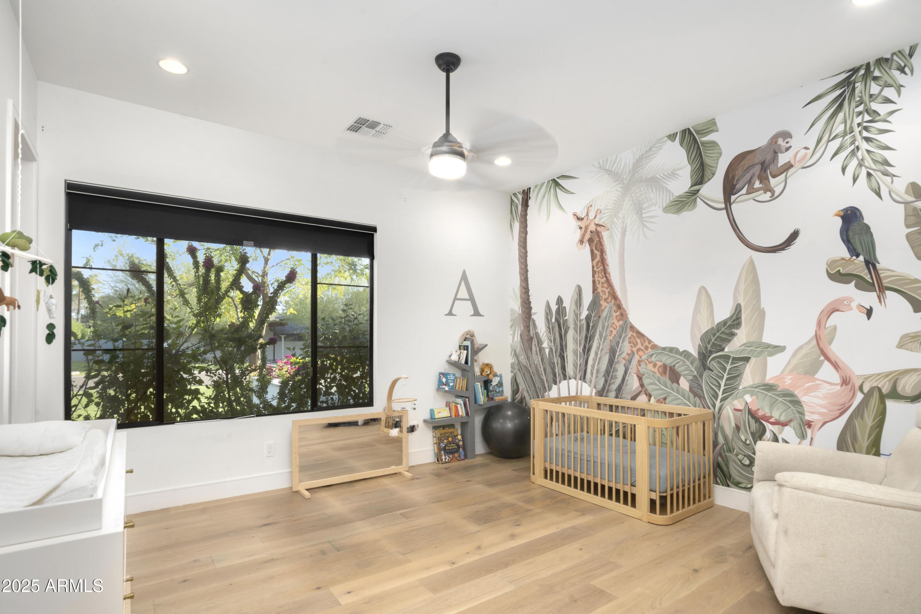 2912 East Pierson Street Phoenix, AZ 85016 - Photo 27 of 39 a view of a livingroom with furniture and a floor to ceiling window